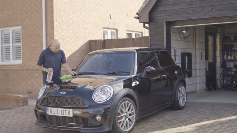 Man Cleaning Car
