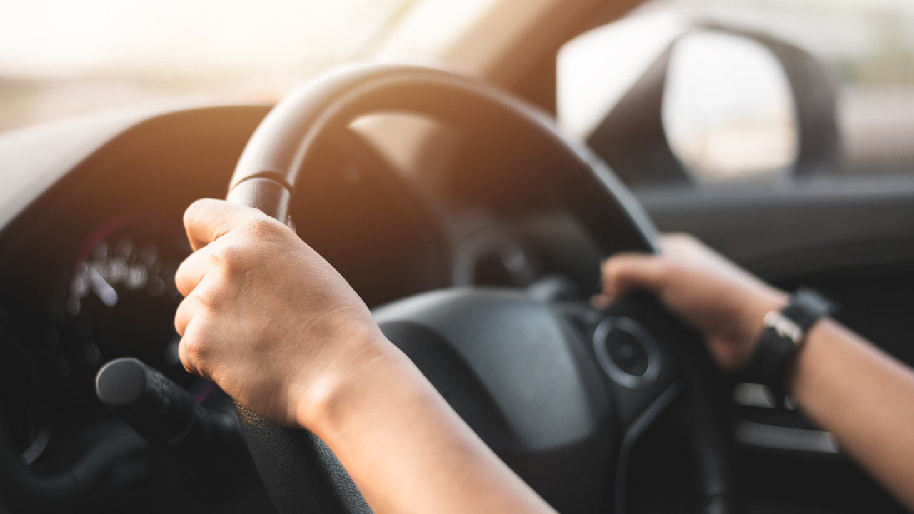 Hands On Car Steering Wheel