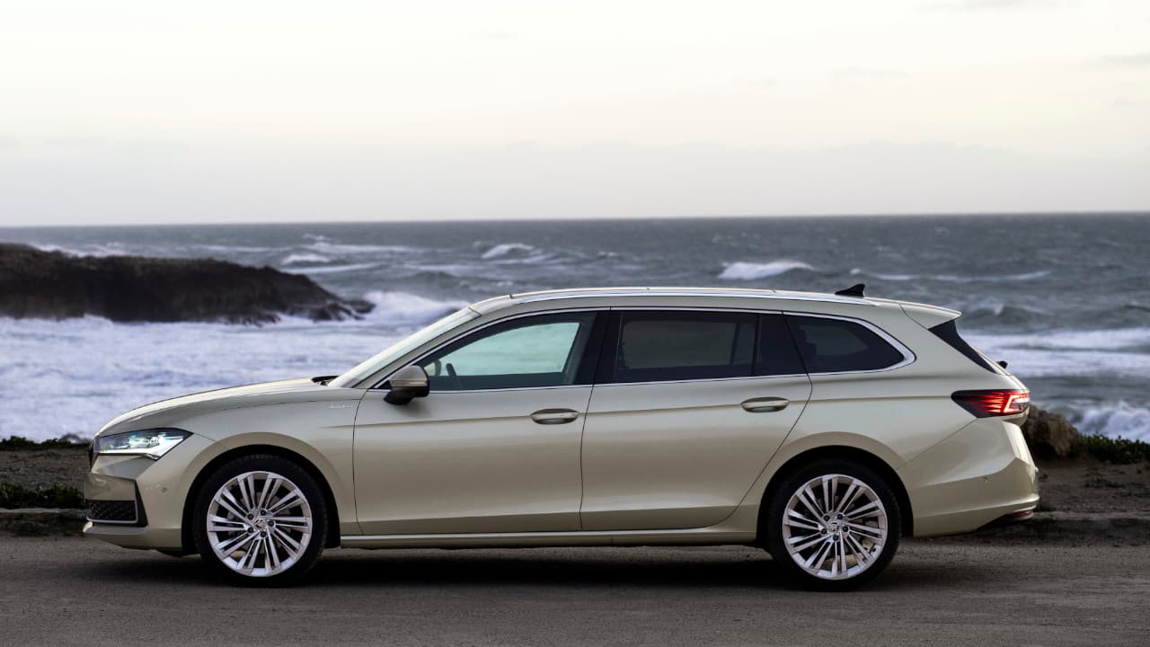 Skoda Superb Estate Side Profile in Gold by Water