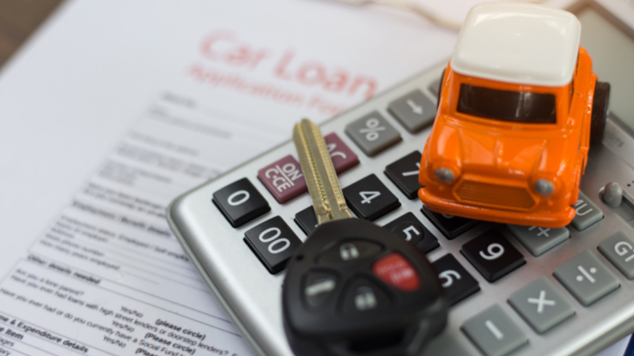 Car Keys and Calculator on Document