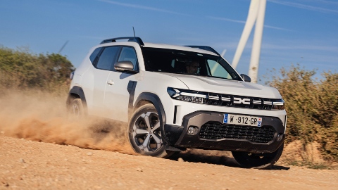 White Dacia Duster Exterior Front Driving Off-Road