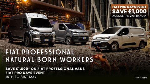Three Fiat Vans Parked in Industrial Setting