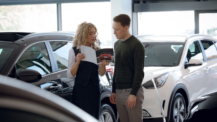 People in Car Showroom