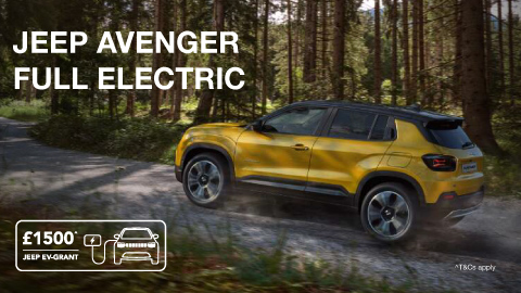 Yellow Jeep Avenger Driving Up Forest Path