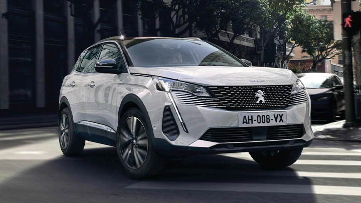 White Peugeot 3008 driving shot