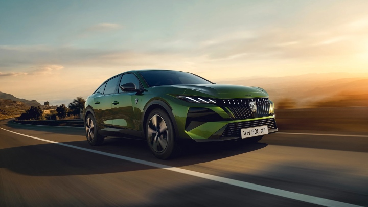 Green Peugeot 408 Exterior Front Driving