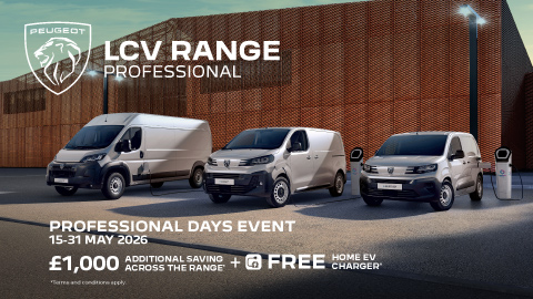 Three Peugeot Vans Parked In Front of Warehouse