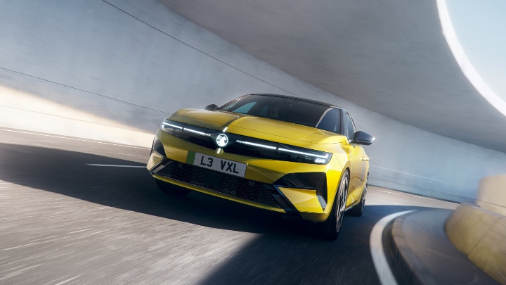 Yellow Vauxhall Astra Exterior Front Driving